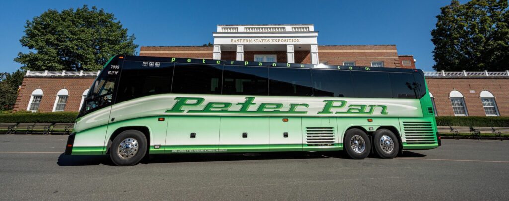 A Peter Pan Bus Lines motorcoach traveling along a major route in the Northeast - affordable and reliable transportation!