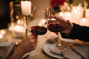 Elegant Valentine's Day dinner setup with candlelight and wine, capturing the romantic ambiance of Washington, D.C.