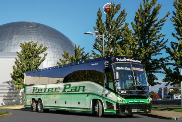 Peter Pan Bus Lines motorcoach parked outside the Naismith Memorial Basketball Hall of Fame in Springfield, Massachusetts.